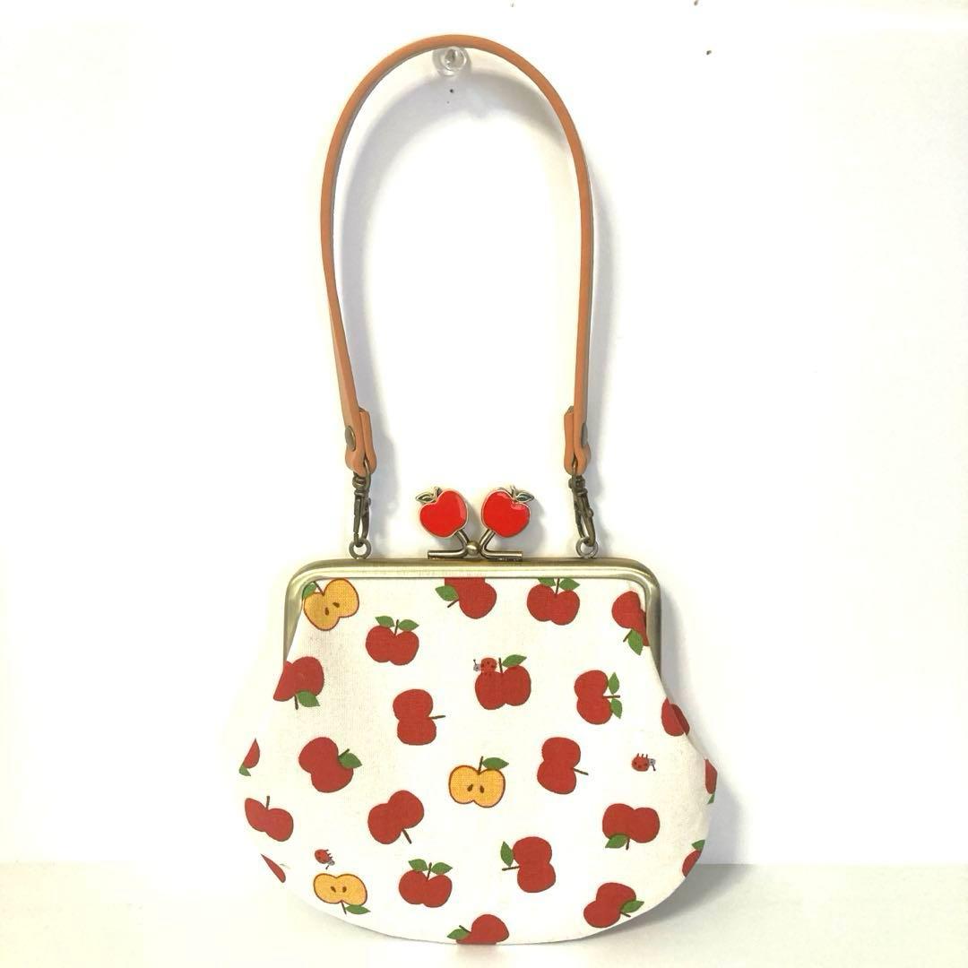 小さなレトロりんごがいっぱいのがま口ポーチ(リンゴげんこ/持ち手付)